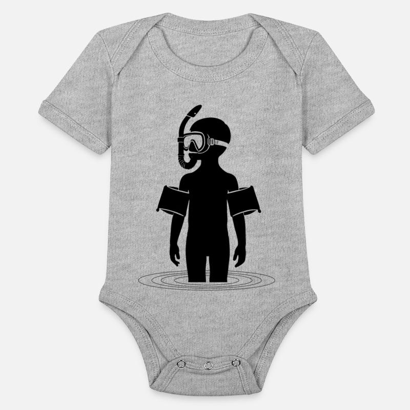 Young man snorkeling in the sea on vacation