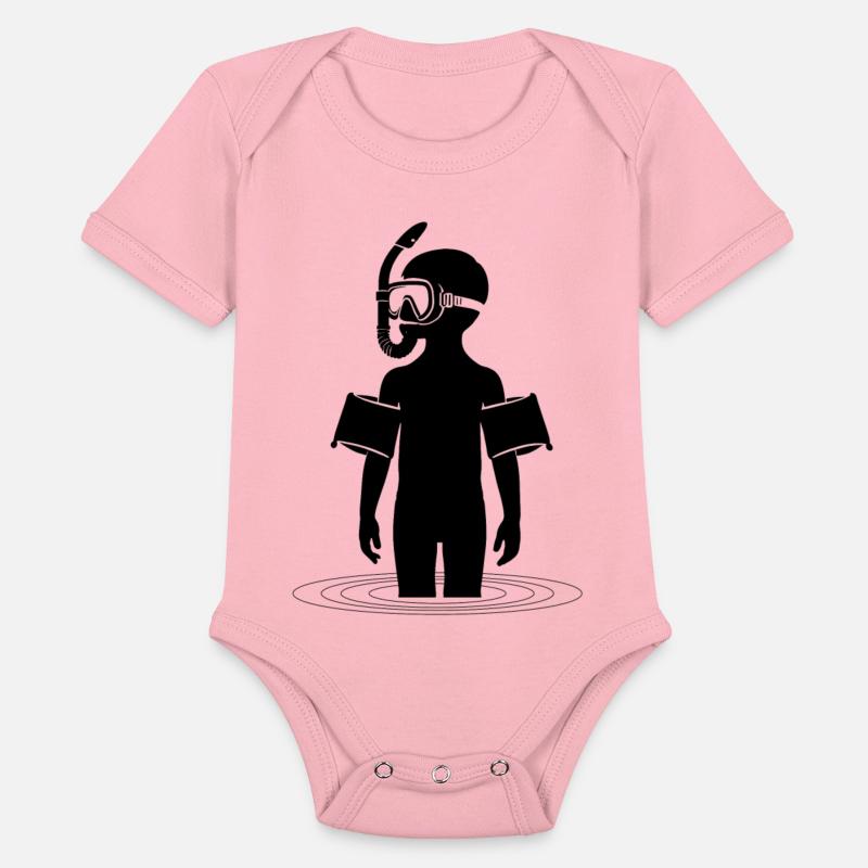 Young man snorkeling in the sea on vacation