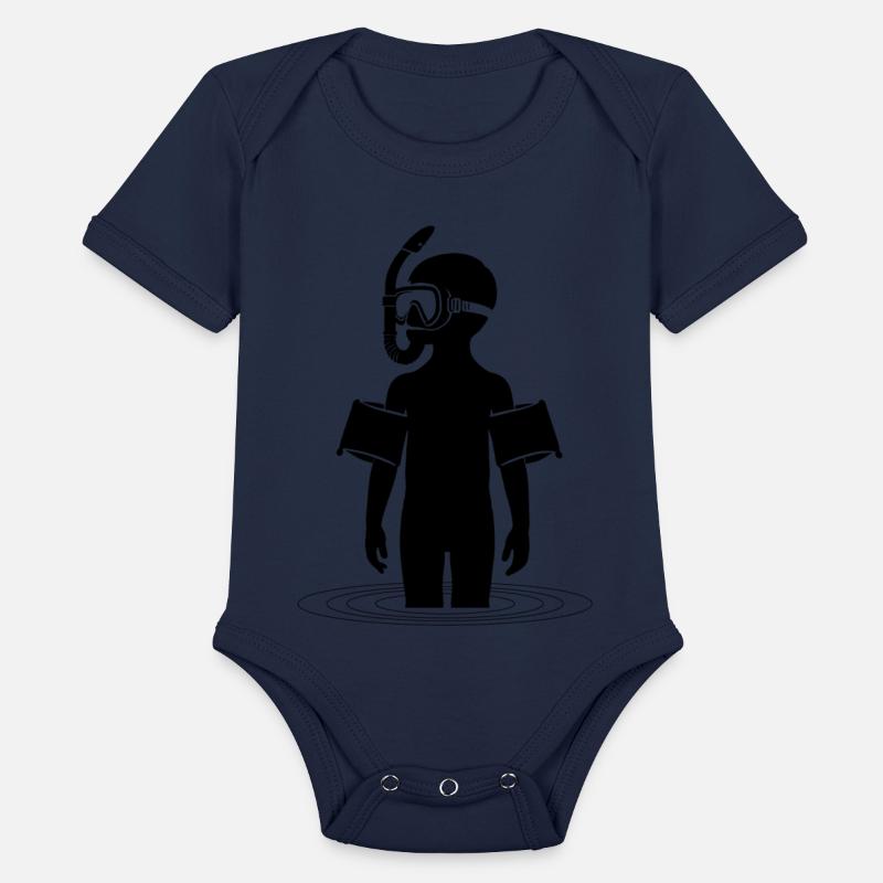 Young man snorkeling in the sea on vacation