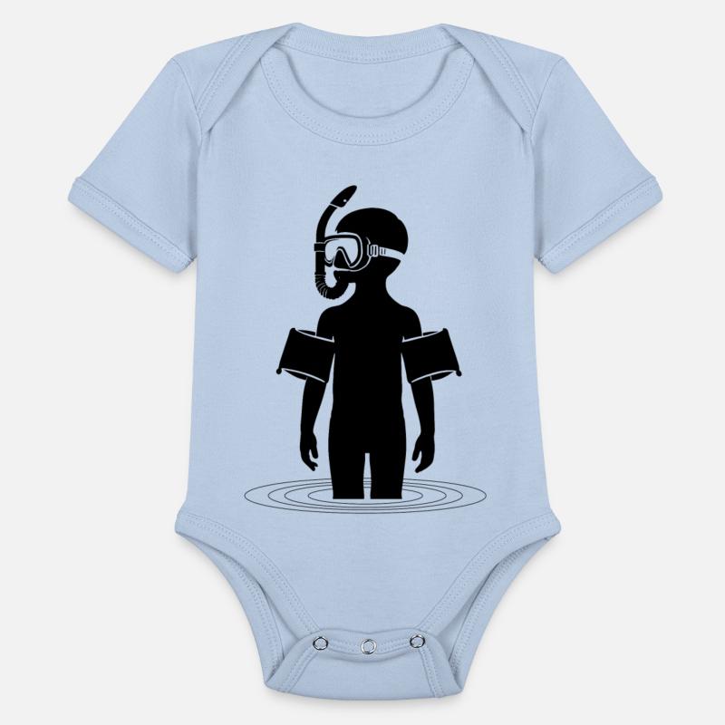 Young man snorkeling in the sea on vacation