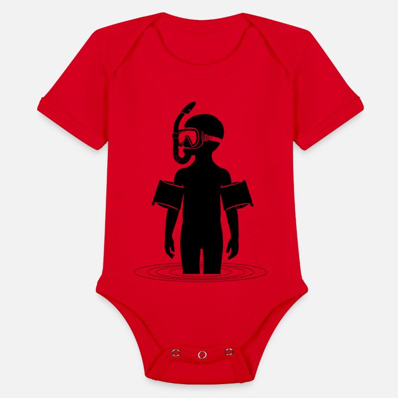 Young man snorkeling in the sea on vacation